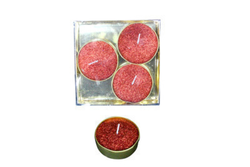 Light up your home with this set of 4 large wax tea light candles in Glittery Red by designer Gisela Graham.